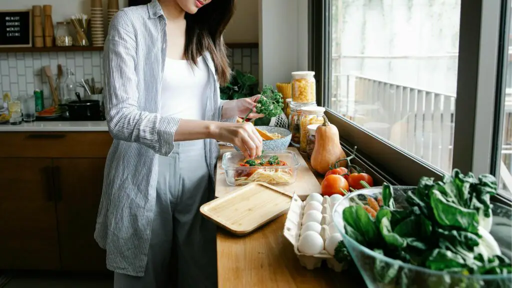 About Me Banner Woman cooking in the kitchen